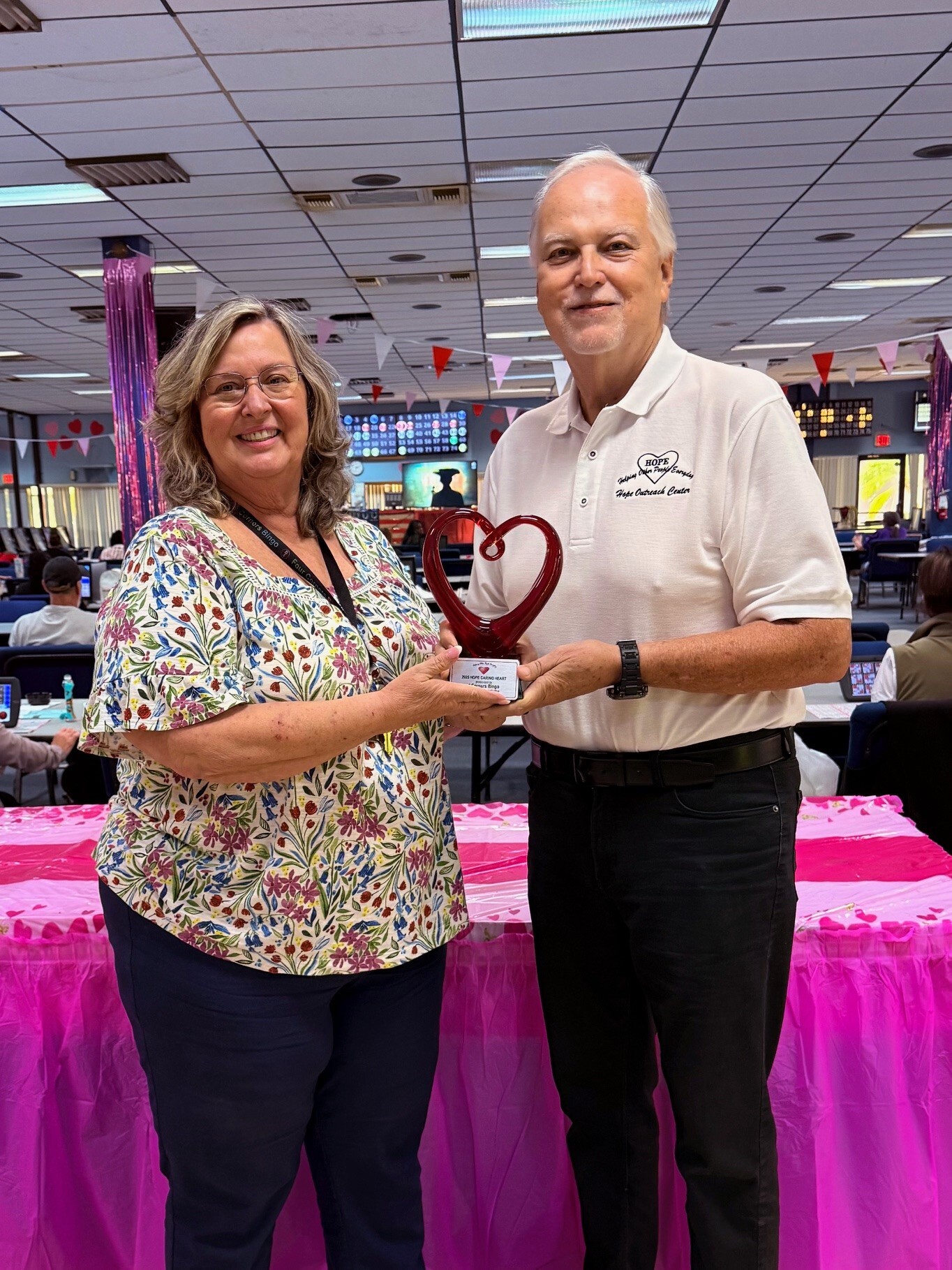 Steve Presenting Brenda 4 Corners Bingo 2025 Hope Caring Heart Award